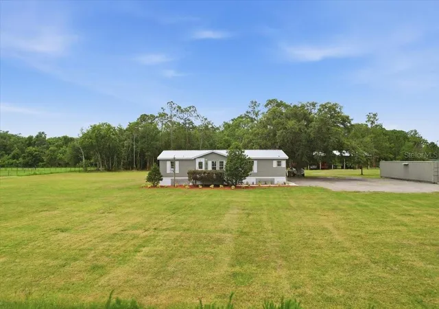 Photo 3 of Manufactured home for sale at 4450 Quail Roost Rd, Saint Cloud, FL 34772 | MLS# S5152336 | Listing updated on 2026-07-01