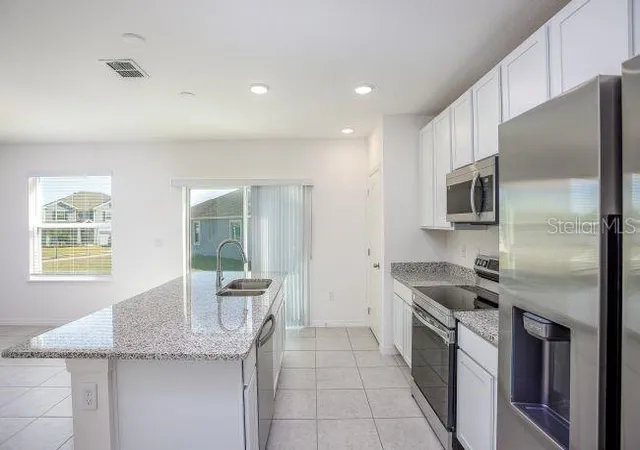 4th image of 8099 Sw 9Th Ln, Gainesville, FL 32607 | MLS# O6419111