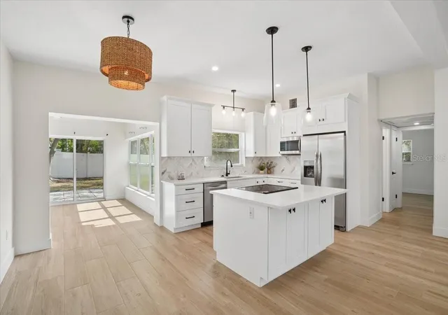 Photo 2 of Single family home for sale at 6765 W Flamingo Way S, Saint Petersburg, FL 33707 | MLS# TB8522093 | Listing updated on 2026-08-26