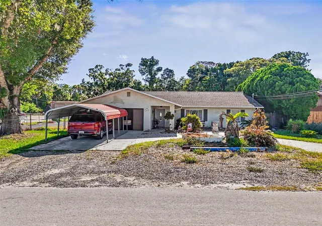 Photo 1 of Single family home for sale at 7813 Leo Kidd Ave, Port Richey, FL 34668 | MLS# W7886977 | Listing updated on 2026-08-17
