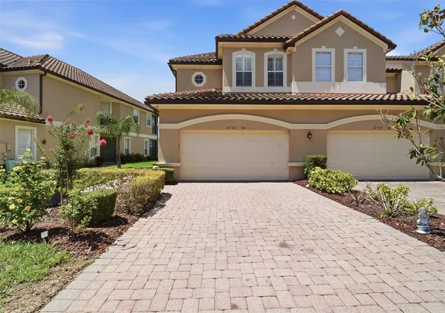 Photo 2 of Townhouse for sale at 8737 The Esplanade #64, Orlando, FL 32836 | MLS# O6419132 | Listing updated on 2026-08-31