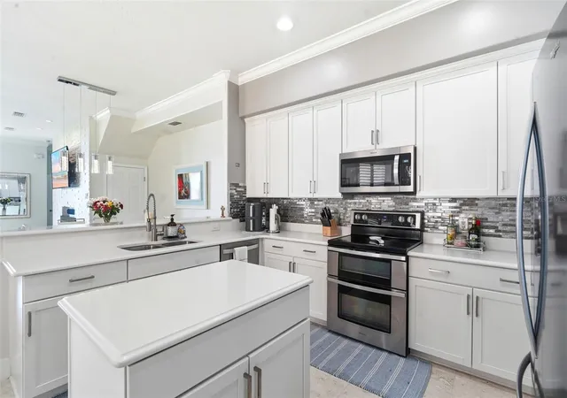 Photo 4 of Townhouse for sale at 8737 The Esplanade #64, Orlando, FL 32836 | MLS# O6419132 | Listing updated on 2026-08-31