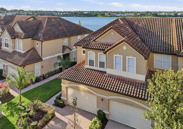 Photo 2 of Townhouse for sale at 8737 The Esplanade #64, Orlando, FL 32836 | MLS# O6419132 | Listing updated on 2026-08-31