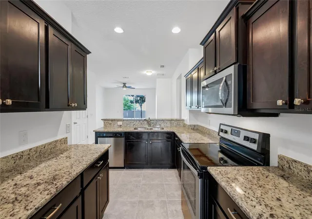 Photo 3 of Townhouse for sale at 4824 Poolside Dr, Saint Cloud, FL 34769 | MLS# O6419191 | Listing updated on 2026-09-05