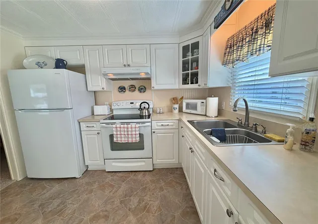 Photo 3 of Manufactured home for sale at 146 Hibiscus Way, Leesburg, FL 34748 | MLS# G5114182 | Listing updated on 2026-06-24
