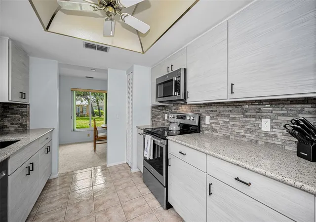 Listing Photo 5 - Condo for sale in building located at 4876 Boonesboro Ct, New Port Richey, FL 34655