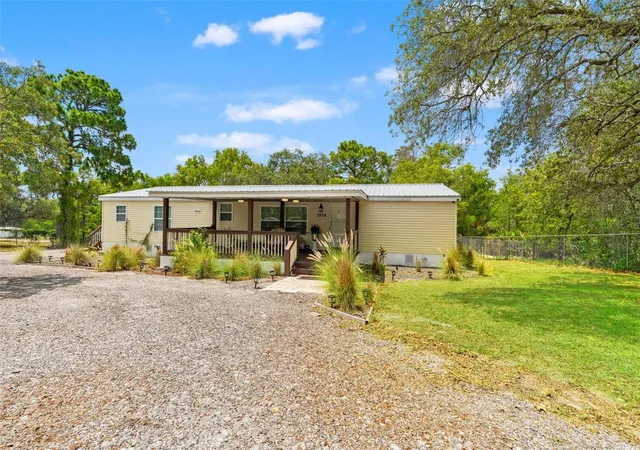 Photo 2 of Manufactured home for sale at 7876 Ridge Rd, Weeki Wachee, FL 34613 | MLS# TB8522315 | Listing updated on 2026-09-03