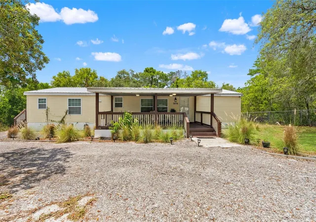 Photo 3 of Manufactured home for sale at 7876 Ridge Rd, Weeki Wachee, FL 34613 | MLS# TB8522315 | Listing updated on 2026-09-03