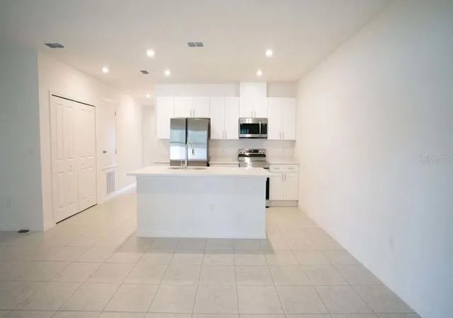 4th image of 862 Sw 80Th Wy, Gainesville, FL 32607 | MLS# O6419304