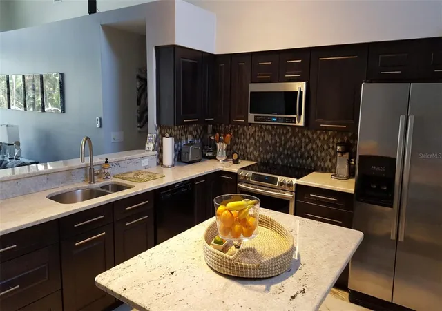 Photo 4 of Single family home for sale at 15211 Arbor Holw Dr, Odessa, FL 33556 | MLS# TB8522417 | Listing updated on 2026-07-11