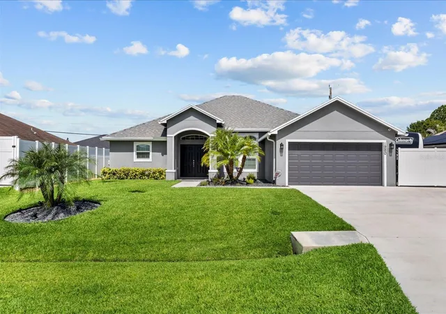 Photo 1 of Single family home for sale at 1980 Sw Americana St, Port Saint Lucie, FL 34953 | MLS# C7527667 | Listing updated on 2026-07-17