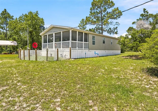 Homes for sale in Morriston, FL | 13330 Se 21st Pl, Morriston, FL 32668 | MLS# OM727258
