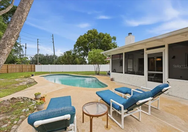 Photo 2 of Single family home for sale at 8495 Caraway Ct, Orlando, FL 32819 | MLS# O6419478 | Listing updated on 2026-08-29