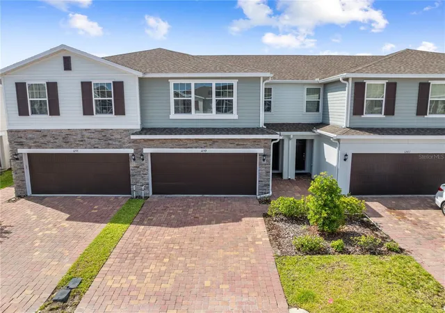 Photo 1 of Townhouse for sale at 1259 Wispy Cypress Dr, Kissimmee, FL 34746 | MLS# O6419499 | Listing updated on 2026-07-03