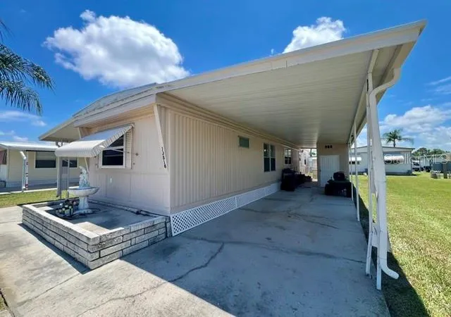 Photo 3 of Manufactured home for sale at 10818 Freedom Dr, Port Richey, FL 34668 | MLS# W7887014 | Listing updated on 2026-06-24