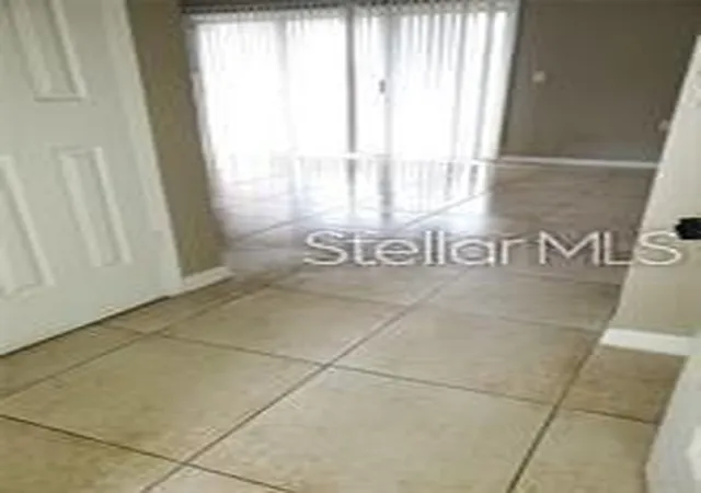 Photo 3 of Condo for sale at 3984 Versailles Dr #3984C, Orlando, FL 32808 | MLS# S5152471 | Listing updated on 2026-09-14