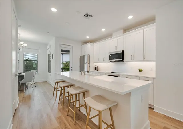 Photo 3 of Townhouse for sale at 12574 Willstatter Ave, Orlando, FL 32827 | MLS# O6419746 | Listing updated on 2026-09-12