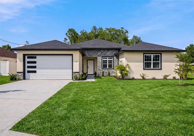 1st image of 2 Buttonbush Ln, Palm Coast, FL 32137 | MLS# O6419832