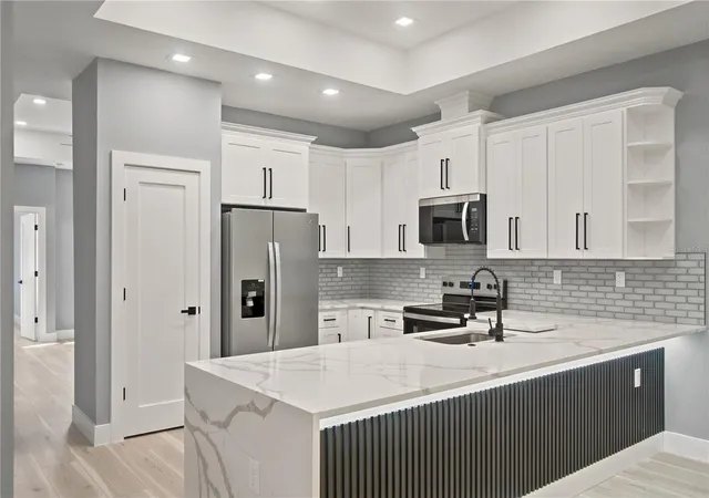 5th image of 2 Buttonbush Ln, Palm Coast, FL 32137 | MLS# O6419832