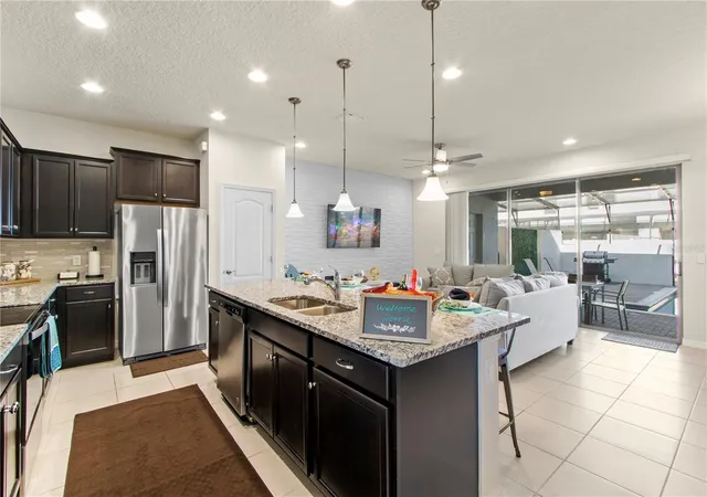 Photo 2 of Townhouse for sale at 2426 Tangier Dr, Kissimmee, FL 34747 | MLS# O6419842 | Listing updated on 2026-06-25