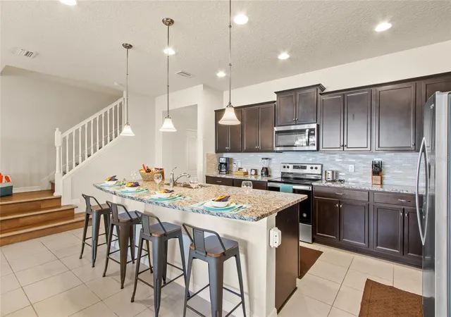 Photo 4 of Townhouse for sale at 2426 Tangier Dr, Kissimmee, FL 34747 | MLS# O6419842 | Listing updated on 2026-06-25