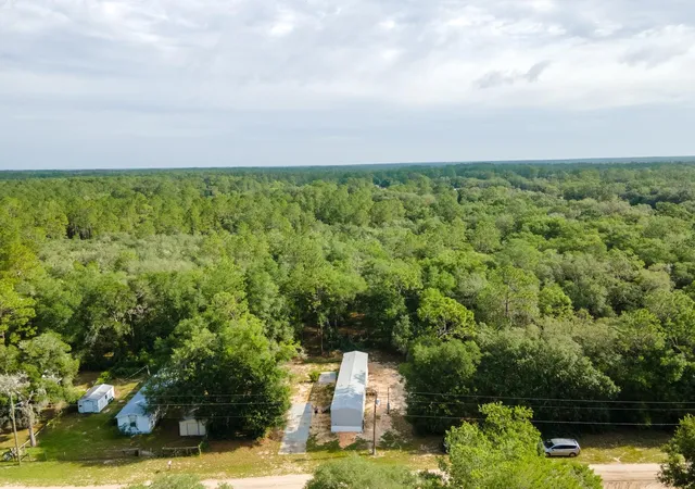 Photo 1 of Manufactured home for sale at 14585 Ne 149th Lane, Fort Mc Coy, FL 32134 | MLS# OM727356 | Listing updated on 2026-09-01