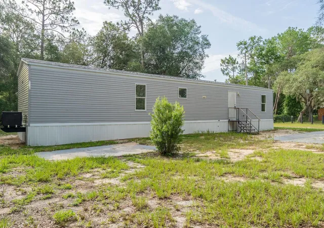 Photo 2 of Manufactured home for sale at 14585 Ne 149th Lane, Fort Mc Coy, FL 32134 | MLS# OM727356 | Listing updated on 2026-09-01