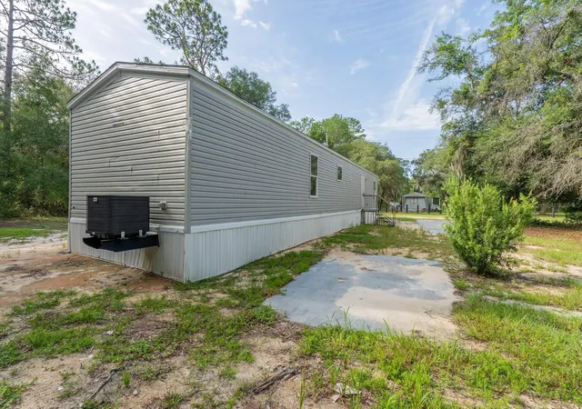 Photo 3 of Manufactured home for sale at 14585 Ne 149th Lane, Fort Mc Coy, FL 32134 | MLS# OM727356 | Listing updated on 2026-09-01