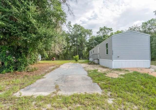 Photo 3 of Manufactured home for sale at 14585 NE 149th Lane, Fort Mc Coy, FL 32134 | MLS# OM727356 | Listing updated on 2026-09-01