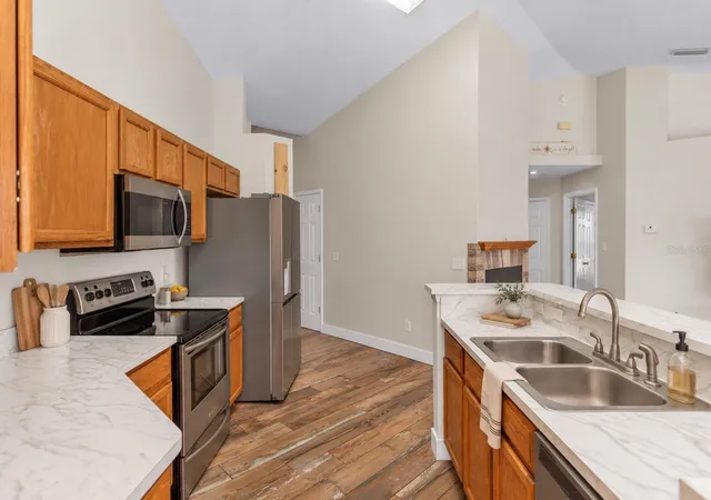 Photo 3 of Single family home for sale at 1005 Whispring Crk Way, Osteen, FL 32764 | MLS# O6419863 | Listing updated on 2026-10-08