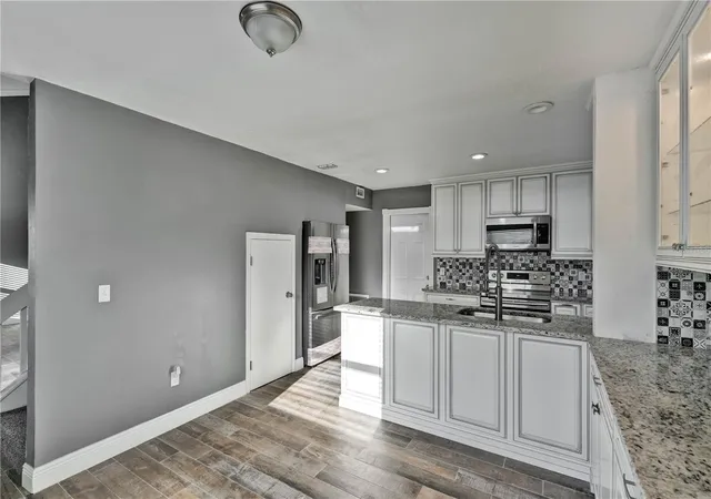 Photo 3 of Single family home for sale at 1879 Kamler Ave, Orlando, FL 32817 | MLS# O6419901 | Listing updated on 2026-09-03