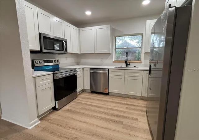 Photo 4 of Single family home for sale at 2035 Voltaire St, Lakeland, FL 33801 | MLS# O6419936 | Listing updated on 2026-06-26