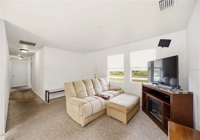 Photo 2 of Single family home for sale at 105 Biscayne Dr, Port Charlotte, FL 33953 | MLS# C7527749 | Listing updated on 2026-07-11