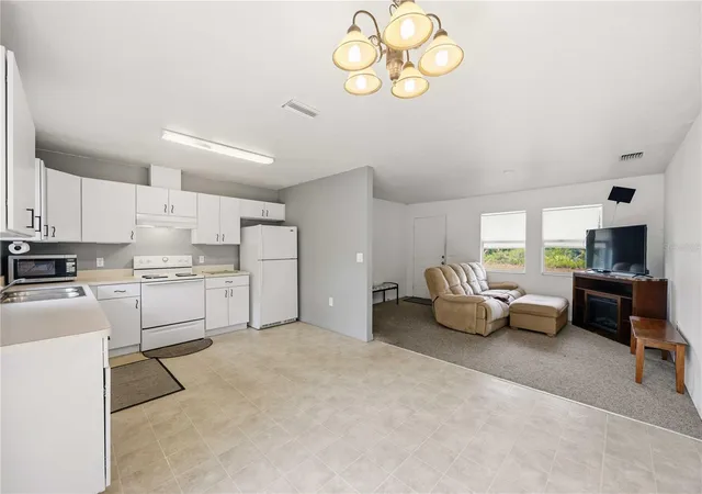 Photo 4 of Single family home for sale at 105 Biscayne Dr, Port Charlotte, FL 33953 | MLS# C7527749 | Listing updated on 2026-10-24