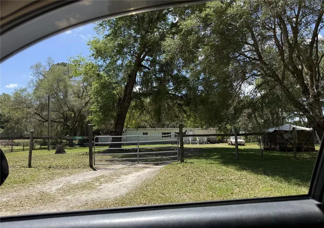 1st image of 11992/11996 Sw 146th Pl, Dunnellon, FL 34432 | MLS# OM727394