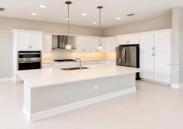 Photo 4 of Single family home for sale at 32630 Neroli St, Wesley Chapel, FL 33543 | MLS# TB8523374 | Listing updated on 2026-09-05