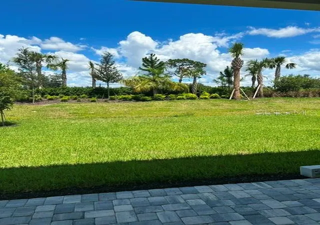 Photo 2 of Single family home for sale at 32630 Neroli St, Wesley Chapel, FL 33543 | MLS# TB8523374 | Listing updated on 2026-09-05