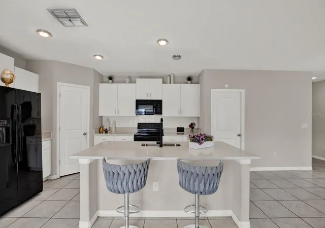 5th image of 3707 Daisy Bloom Pl, Tampa, FL 33619 | MLS# TB8523472