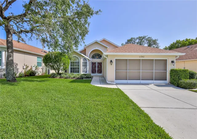 Photo 3 of Single family home for sale at 11261 Mcracken Dr, Spring Hill, FL 34609 | MLS# W7887085 | Listing updated on 2026-09-29