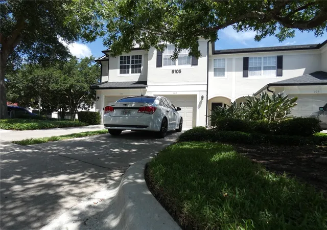 Photo 2 of Townhouse for sale at 6105 Twain St #102, Orlando, FL 32835 | MLS# O6420187 | Listing updated on 2026-06-30