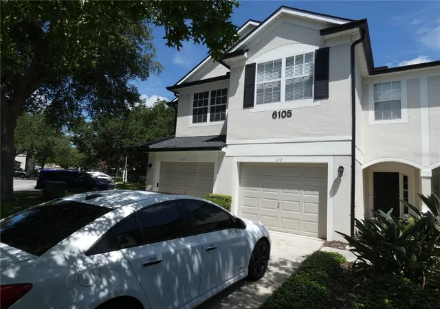 Photo 3 of Townhouse for sale at 6105 Twain St #102, Orlando, FL 32835 | MLS# O6420187 | Listing updated on 2026-06-30