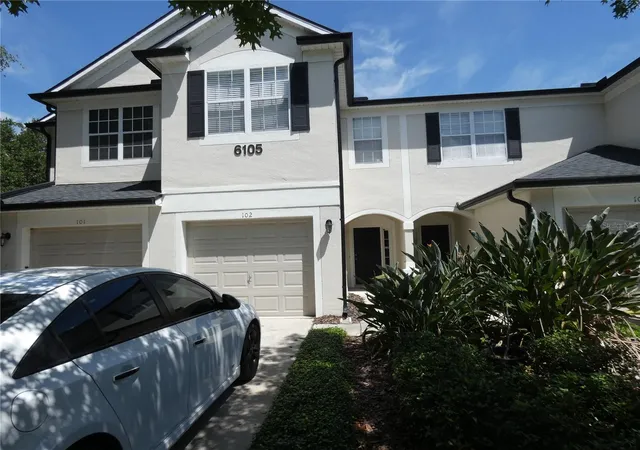 Photo 3 of Townhouse for sale at 6105 Twain St #102, Orlando, FL 32835 | MLS# O6420187 | Listing updated on 2026-06-30