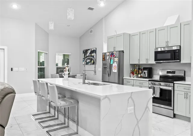 Photo 2 of Single family home for sale at 14112 Lord Barclay Dr, Orlando, FL 32837 | MLS# S5152556 | Listing updated on 2026-07-12