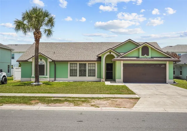 Photo 3 of Single family home for sale at 213 Competition Dr, Kissimmee, FL 34743 | MLS# O6420239 | Listing updated on 2026-09-23