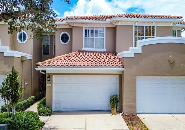 Photo 1 of Townhouse for sale at 256 Valencia Cir, St Petersburg, FL 33716 | MLS# TB8523576 | Listing updated on 2026-06-30