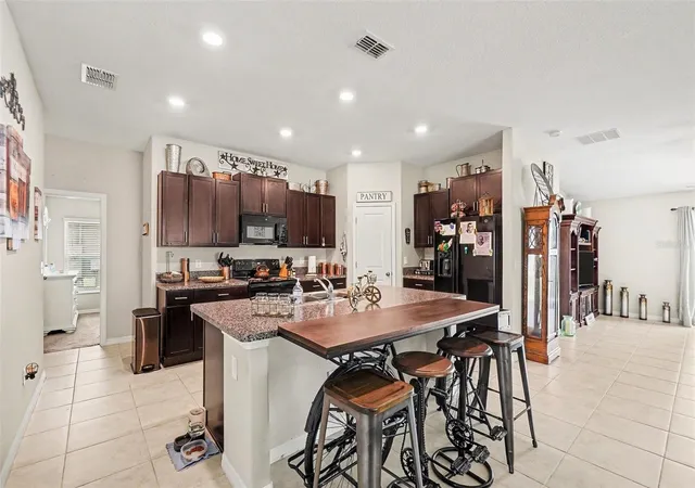 Photo 3 of Single family home for sale at 14907 Imperial Purple Ln, Wimauma, FL 33598 | MLS# TB8523632 | Listing updated on 2026-09-30