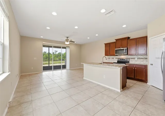Photo 2 of Townhouse for sale at 8961 Turnstone Hvn Pl, Tampa, FL 33619 | MLS# TB8523667 | Listing updated on 2026-08-23