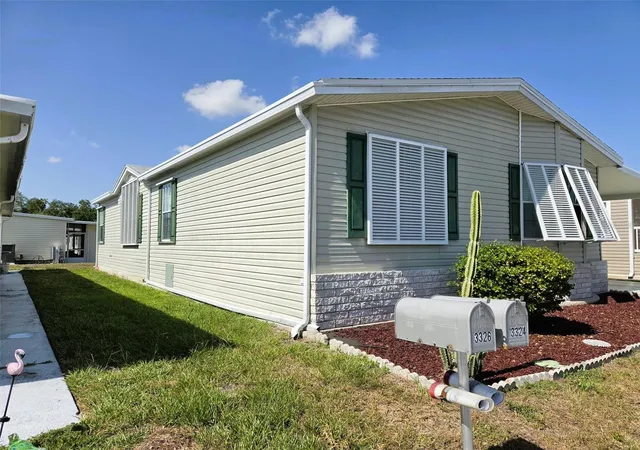Photo 2 of Manufactured home for sale at 3324 Overcup Oak Ter, Sarasota, FL 34237 | MLS# A4698245 | Listing updated on 2026-09-04