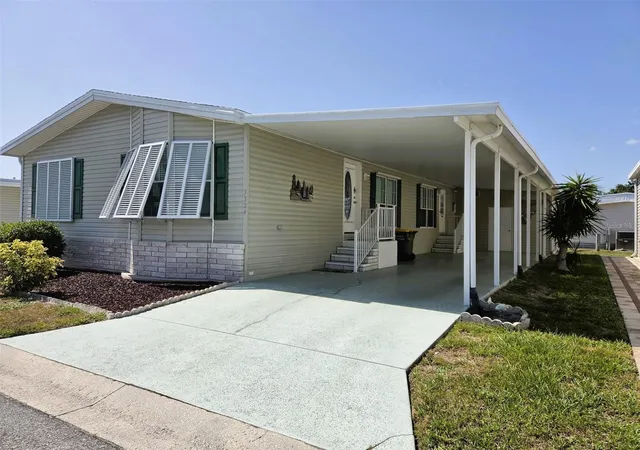 Photo 3 of Manufactured home for sale at 3324 Overcup Oak Ter, Sarasota, FL 34237 | MLS# A4698245 | Listing updated on 2026-09-04