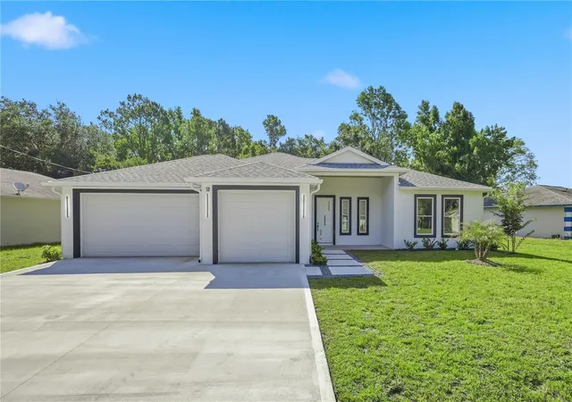 Photo 1 of Single family home for sale at 12 Perthshire Ln, Palm Coast, FL 32164 | MLS# FC319544 | Listing updated on 2026-10-06